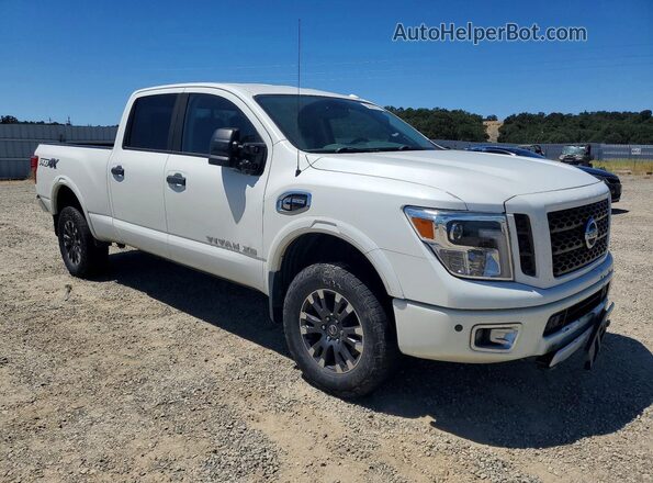 1N6BA1F47KN506563 2019 NISSAN TITAN Белый Передняя правая четверть