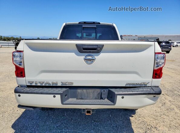1N6BA1F47KN506563 2019 NISSAN TITAN Белый Вид сзади