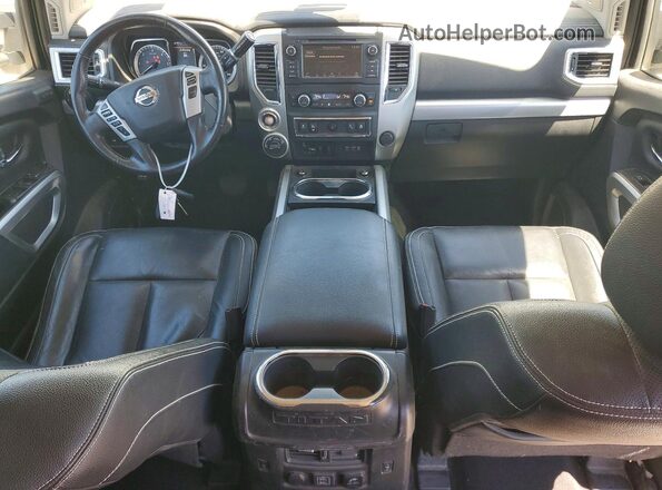1N6BA1F47KN506563 2019 NISSAN TITAN Белый Вид панели приборов