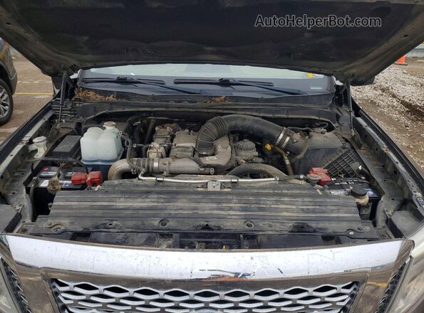 1N6BA1F48HN545350 2017 NISSAN TITAN Brown Vista interior trasera