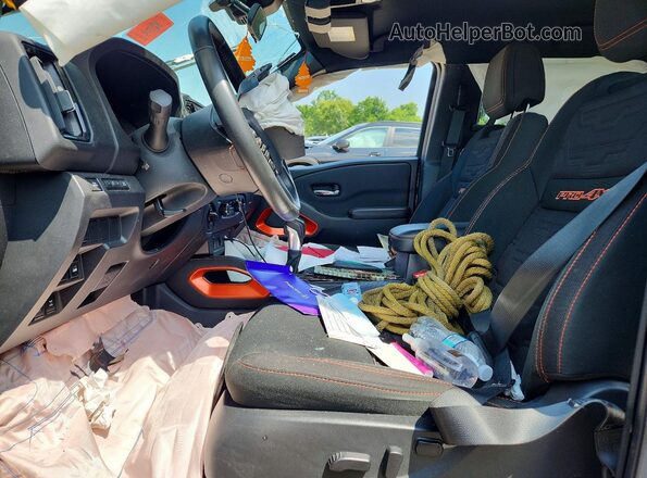 1N6ED1EK2SN621107 2025 NISSAN FRONTIER Green Vista interior delantera