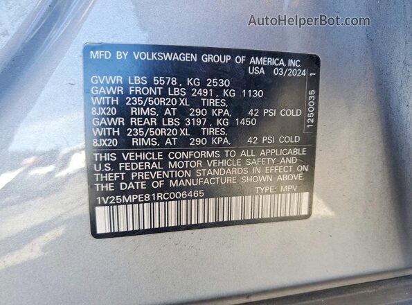 1V25MPE81RC006465 2024 VOLKSWAGEN ID.4 Silver Widok naklejki z numerem VIN