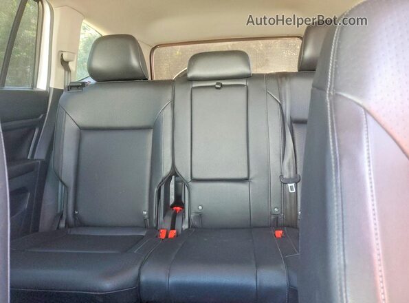 1V2CR2CA8JC562679 2018 VOLKSWAGEN ATLAS White Vista de los asientos traseros