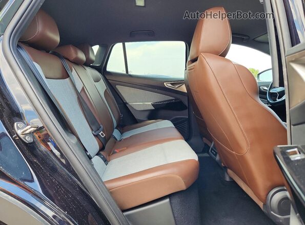 1V2DNPE82PC047421 2023 VOLKSWAGEN ID.4 Black Vista interior trasera