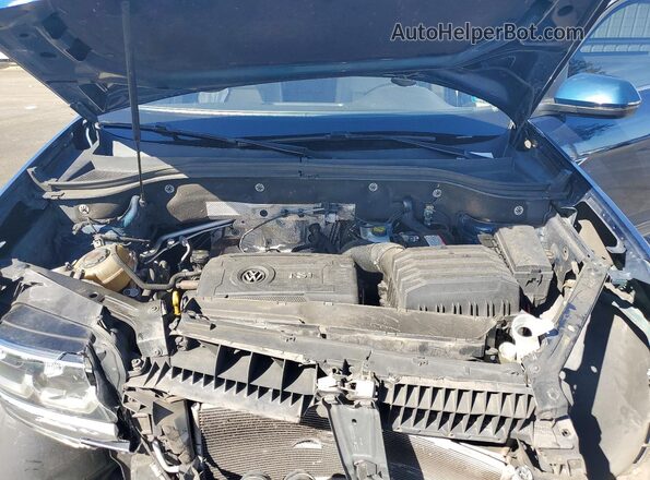 1V2DP2CA7JC592329 2018 VOLKSWAGEN ATLAS Blue Vista interior trasera