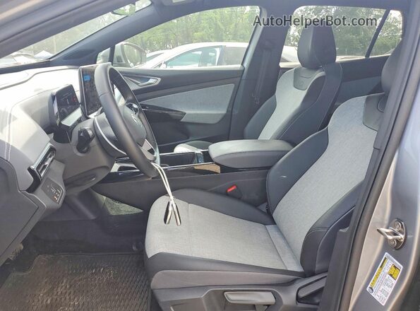 1V2DSPE84SC010226 2025 VOLKSWAGEN ID.4 Silver Widok wnętrza z przodu