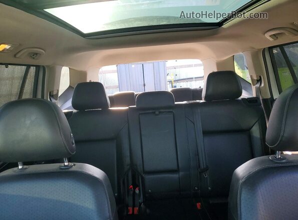 1V2ER2CAXJC521866 2018 VOLKSWAGEN ATLAS Silver Widok tylnych siedzeń