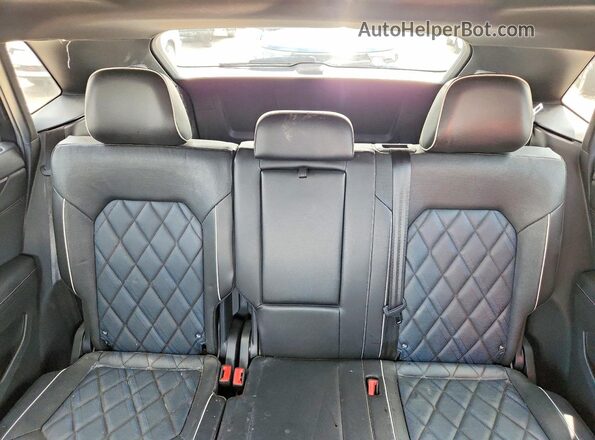 1V2FE2CA7RC261910 2024 VOLKSWAGEN ATLAS Black Vista de los asientos traseros