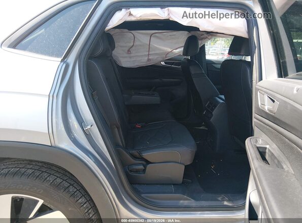 1V2HE2CA9RC216489 2024 VOLKSWAGEN ATLAS Silver Widok naklejki z numerem VIN