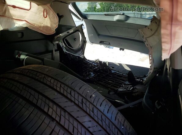 1V2HR2CA1SC557931 2025 VOLKSWAGEN ATLAS White Vista de los asientos traseros