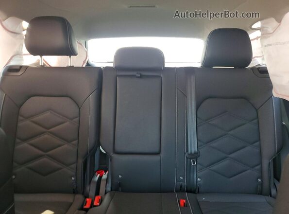 1V2WN2CA3TC530556 2026 VOLKSWAGEN ATLAS Blue Vista de los asientos traseros