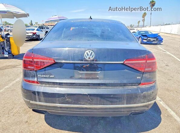 1VWHM7A34HC064395 2017 VOLKSWAGEN PASSAT Black Widok z tyłu