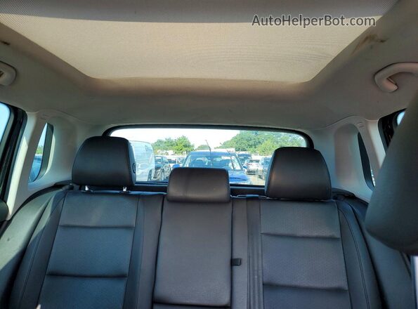 WVGBV7AX0GW515176 2016 VOLKSWAGEN TIGUAN Black Вид задньої частини салону