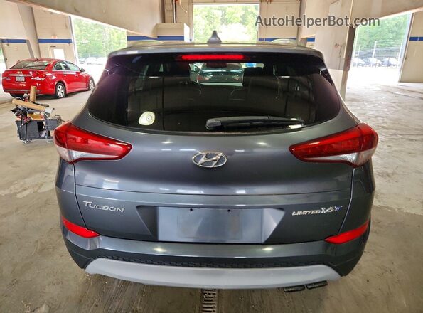 KM8J33A2XHU389033 2017 HYUNDAI TUCSON Gray Вид салону спереду