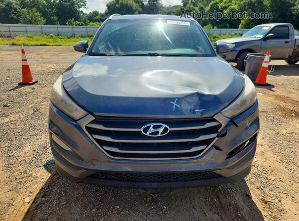 KM8J33A47GU228770 2016 HYUNDAI TUCSON Charcoal Vista trasera