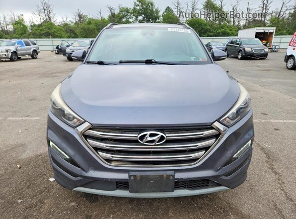 KM8J3CA28HU304044 2017 HYUNDAI TUCSON Gray Widok z tyłu