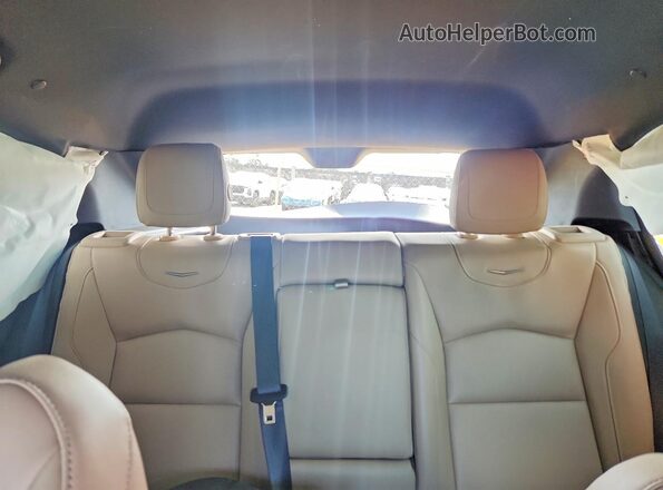 1GYAZAR48RF120896 2024 CADILLAC XT4 White Vista interior trasera