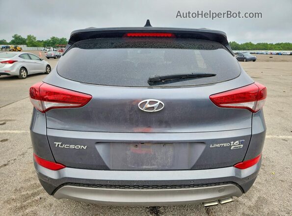 KM8J3CA28HU304044 2017 HYUNDAI TUCSON Gray Widok wnętrza z przodu