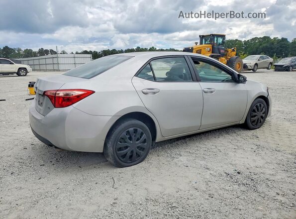 5YFBURHE3KP896868 2019 TOYOTA COROLLA Серебряный Передняя правая четверть