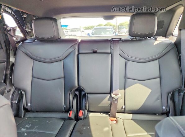 1GYKNCRS6SZ118739 2025 CADILLAC XT5 Black Vista interior trasera
