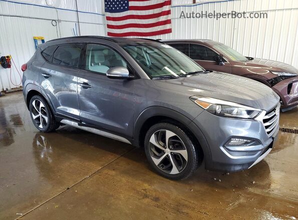 KM8J3CA22JU690014 2018 HYUNDAI TUCSON Gray Вид спереду