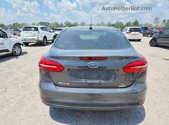 1FADP3FE3JL204220 2018 FORD FOCUS Gray Вид салону спереду