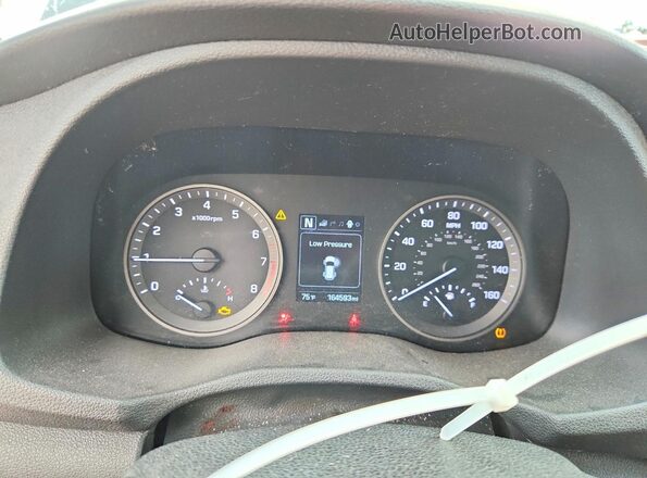KM8J3CA26GU050249 2016 HYUNDAI TUCSON Gray უკანა სავარძლების ხედი