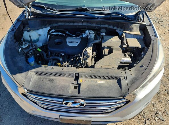 KM8J3CA23JU615371 2018 HYUNDAI TUCSON Silver Vista de la etiqueta del VIN