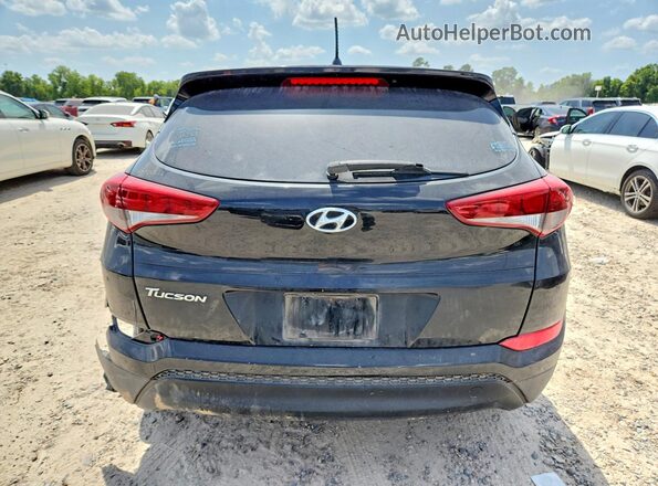 KM8J23A46JU802267 2018 HYUNDAI TUCSON Black წინა სალონის ხედი