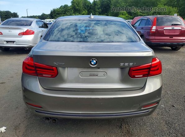 WBA8E3G53GNU05187 2016 BMW 3 SERIES Желто-коричневый Вид салона спереди