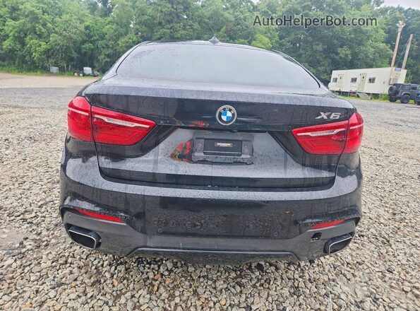5UXKU2C52K0Z65590 2019 BMW X6 Black Widok wnętrza z przodu