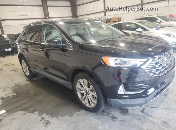 2FMPK3K96KBB43554 2019 FORD EDGE Black Front view