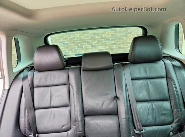 WVGBV7AX9GW591737 2016 VOLKSWAGEN TIGUAN Белый Вид задней части салона