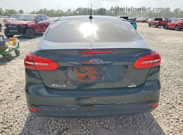 1FADP3FE7JL243862 2018 FORD FOCUS Black წინა სალონის ხედი