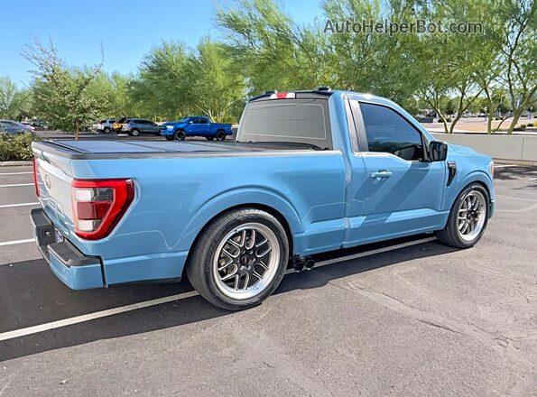 1FTMF1C54PKF13263 2023 FORD F150 Blue Вид спереду