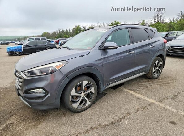 KM8J3CA28HU304044 2017 HYUNDAI TUCSON Gray Tył lewy