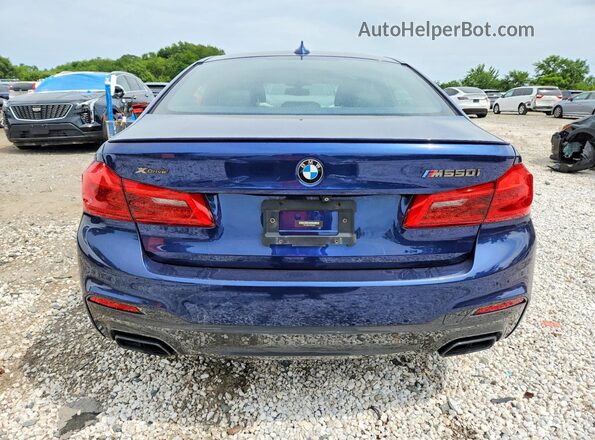WBAJB9C59JB049338 2018 BMW M5 Синий Вид салона спереди