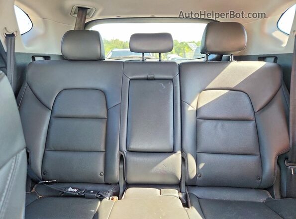 KM8J3CA23JU615371 2018 HYUNDAI TUCSON Silver Vista interior trasera