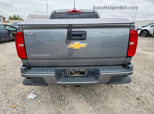 1GCPTDE14K1169904 2019 CHEVROLET COLORADO Gray Front interior view