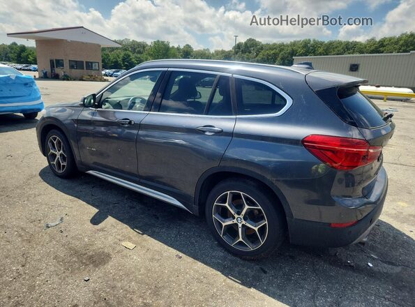 WBXHT3C31GP882429 2016 BMW X1 Gray Rear right