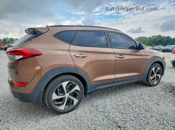 KM8J33A20GU076961 2016 HYUNDAI TUCSON Brown Delantero derecho