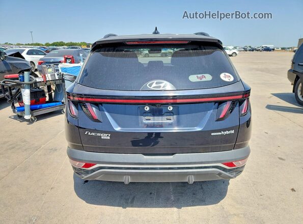 KM8JBCA1XNU031775 2022 HYUNDAI TUCSON Blue Front interior view