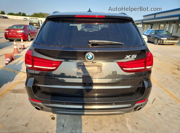 5UXKR2C58G0U17201 2016 BMW X5 Black Vista interior delantera