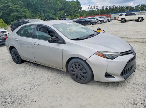 5YFBURHE3KP896868 2019 TOYOTA COROLLA Серебряный Вид спереди