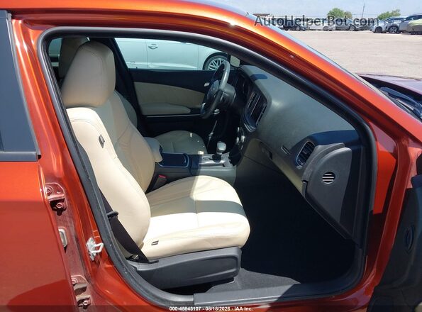 2C3CDXBG0PH608079 2023 DODGE CHARGER Orange Widok wnętrza z przodu