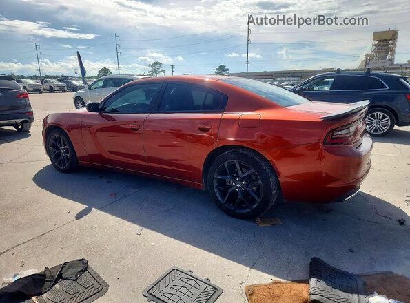 2C3CDXBG4NH217269 2022 DODGE CHARGER Orange Trasero izquierdo