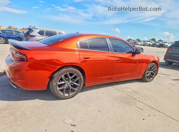 2C3CDXBG4NH217269 2022 DODGE CHARGER Orange Trasero derecho