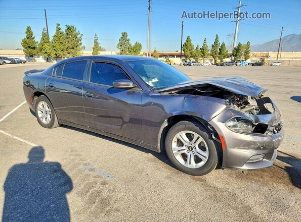 2C3CDXBG5KH748282 2019 DODGE CHARGER Gray Delantero derecho