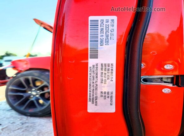 2C3CDXGJ0MH528510 2021 DODGE CHARGER Orange Widok naklejki z numerem VIN