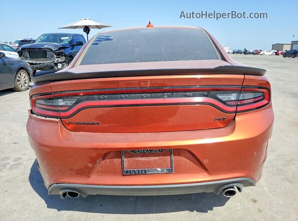 2C3CDXHG0PH512959 2023 DODGE CHARGER Оранжевый Вид салона спереди